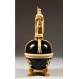 A VERY FINE 19TH CENTURY DIEPPE IVORY AND WOOD ORB, the top with a finial triptych of Joan of Arc,