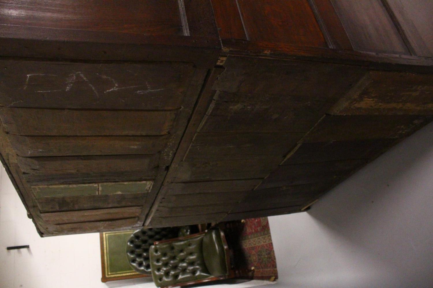 A 17TH/18TH CENTURY OAK COURT CUPBOARD, with carved frieze over two carved central panels flanked by - Image 8 of 10
