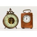 A SMALL CIRCULAR FRENCH BAROMETER, 7cms diameter, and A SMALL CLOCK, in a plated case, 7.5cms
