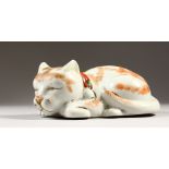 A 20TH CENTURY JAPANESE KUTANI PORCELAIN MODEL OF A SLEEPING CAT, the base unglazed, 7in long & 3.