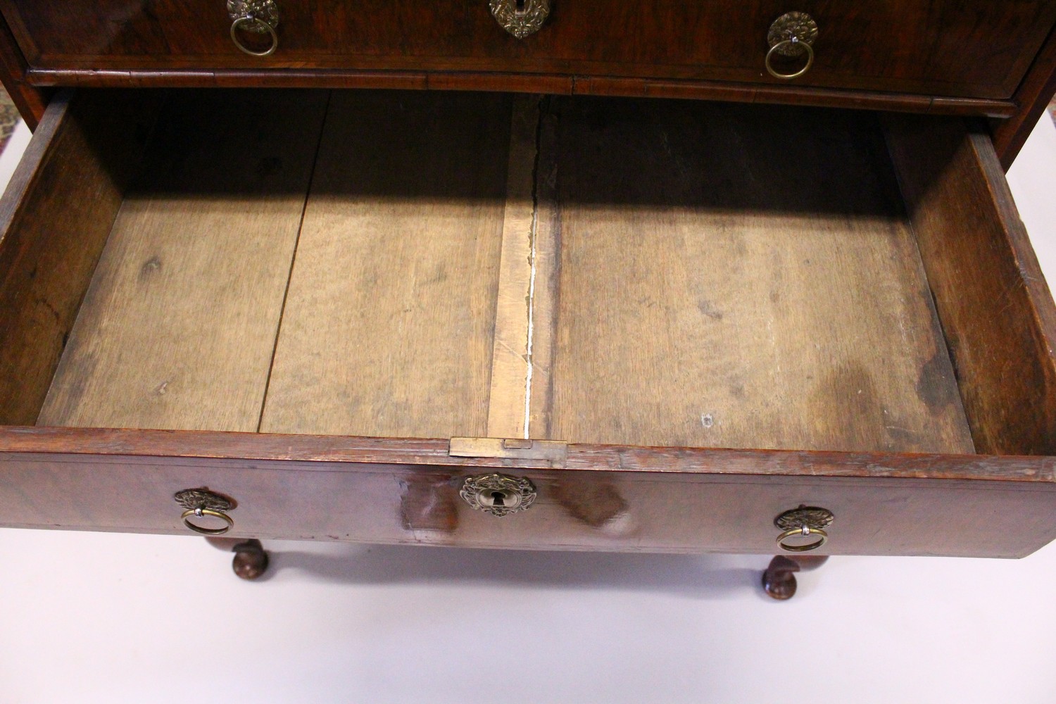 AN EARLY 18TH CENTURY WALNUT CHEST ON STAND, with a herringbone inlaid top, four graduated long - Image 9 of 17