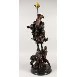 A LARGE CHINESE CARVED "ROOTWOOD" FIGURAL TABLE LAMP. 79cms high, including lamp fitting.