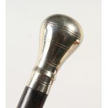 A ROSEWOOD CANE, with white metal top. 93cms long.