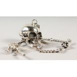 A SILVER SKULL AND CHAIN.