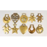 TEN VARIOUS ANTIQUE HORSE BRASSES, crescents, hearts, etc.