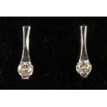 A PAIR OF 14CT WHITE GOLD DIAMOND DROP EARRINGS. 0.5ct approx.