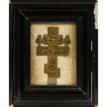 A FRAMED BRASS CRUCIFIX. Crucifix: 12cms x 6cms.