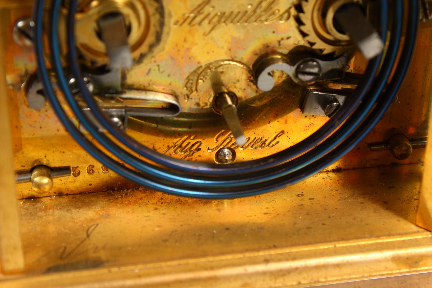 A FRENCH BRASS CARRIAGE CLOCK, with repeat and alarm, striking on a gong, in a leather case. 14cms - Image 6 of 14