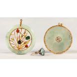 TWO GOLD AND JADE PENDANTS.