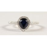 AN 18CT WHITE GOLD PEAR SHAPED SAPPHIRE AND DIAMOND RING of 1.5cts.