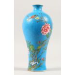 A GOOD CHINESE MEIPING VASE, pale blue ground with incised decoration, painted with flowers and