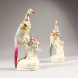 TWO 19TH CENTURY ENGLISH PORCELAIN BIRD QUILL HOLDERS, CIRCA. 1850. 17cms high.