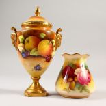 A SMALL COALPORT URN AND COVER, painted with fruit, 17cms high, and A SMALL ROYAL WORCESTER VASE,