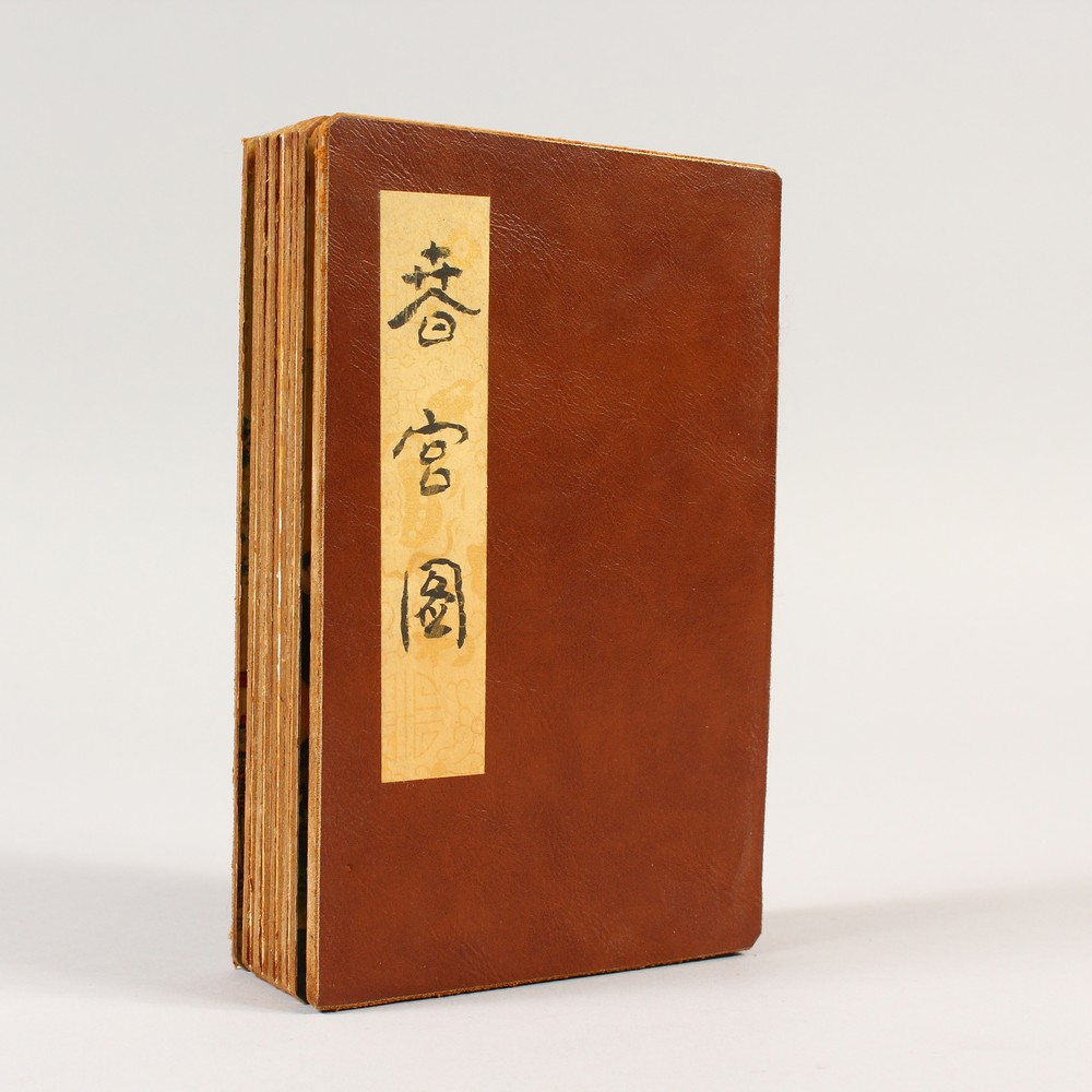 A CHINESE FOLDING EROTIC BOOK. 19cms high.