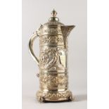 A LARGE VICTORIAN WINE FLAGON with repousse classical scrolls and acanthus. 35cms high. London 1880.