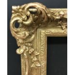 20th Century English School. A Gilt Composition Frame, with Swept and Pierced Centres and