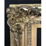 19th Century English School. A Gilt Composition Frame, with Swept and Pierced Centres and Corners,