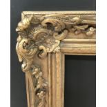 20th Century English School. A Gilt Composition Frame, with Swept and Pierced Centres and Corners,