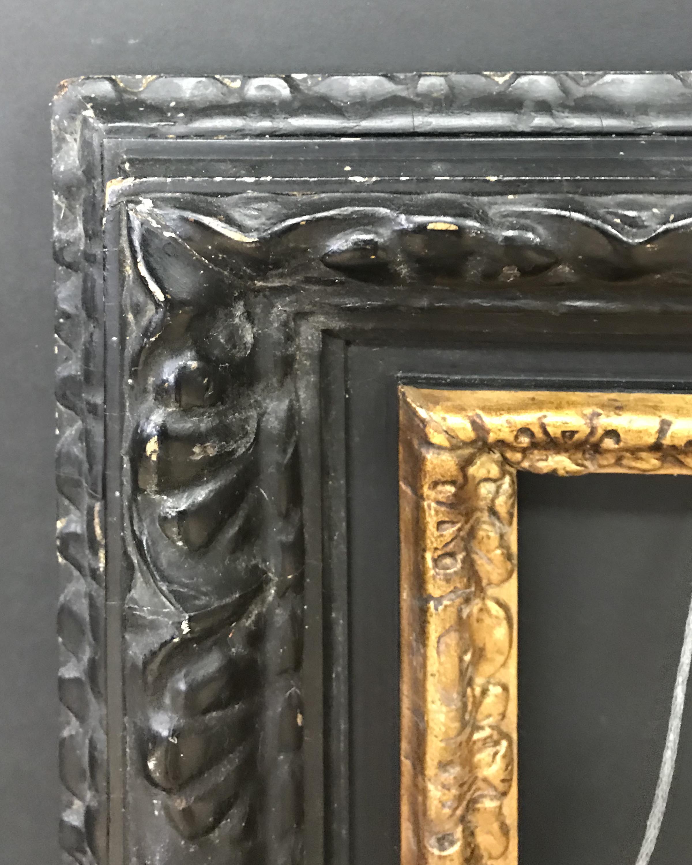 19th Century Italian School. A Venetian Style Black and Gilt Frame, 23.5" x 13.5" (rebate).