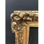 20th Century English School. A Gilt Composition Frame with Swept Centres, 36" x 28" (rebate).