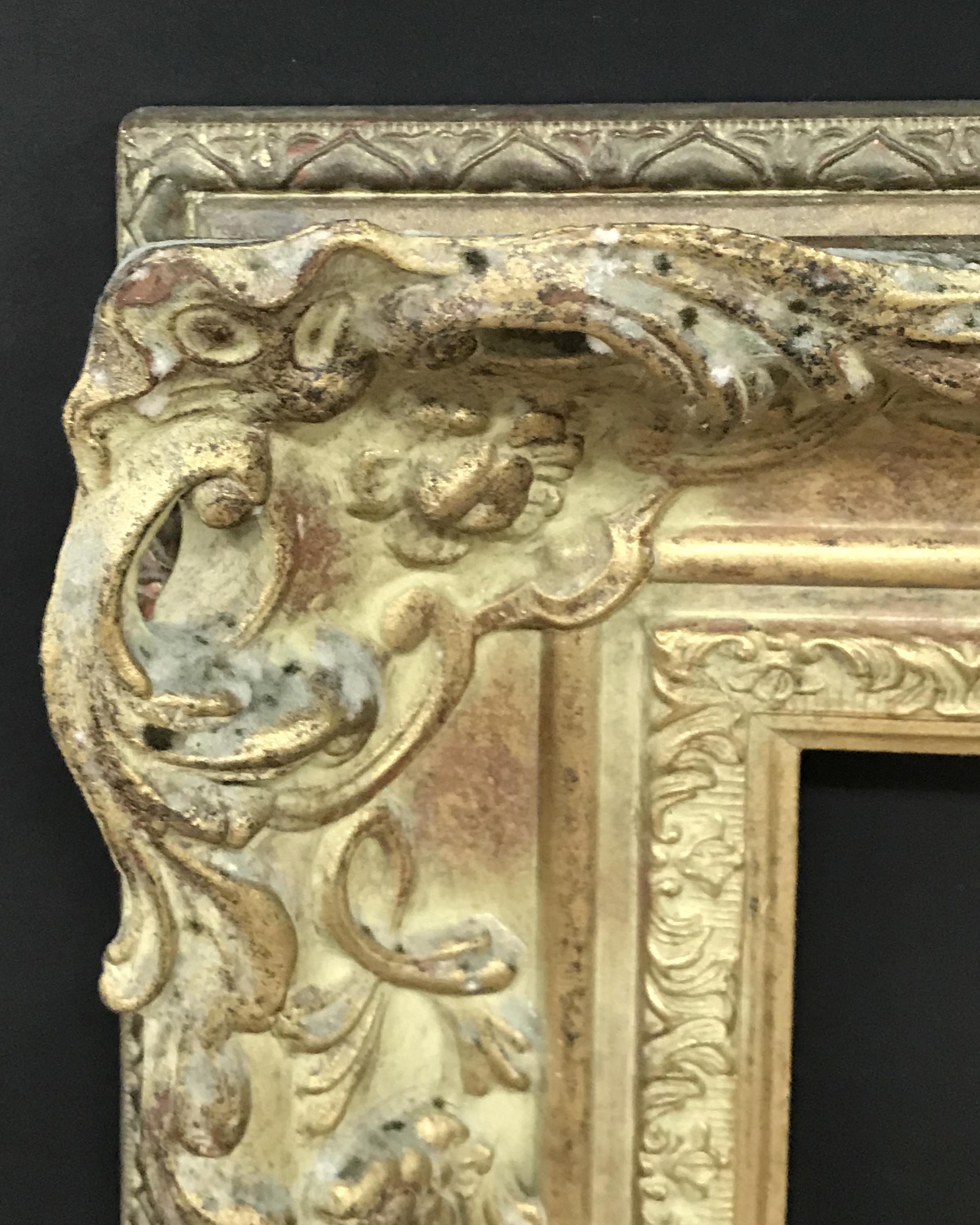 20th Century English School. A Gilt Composition Frame, with Swept and Pierced Centres and Corners,