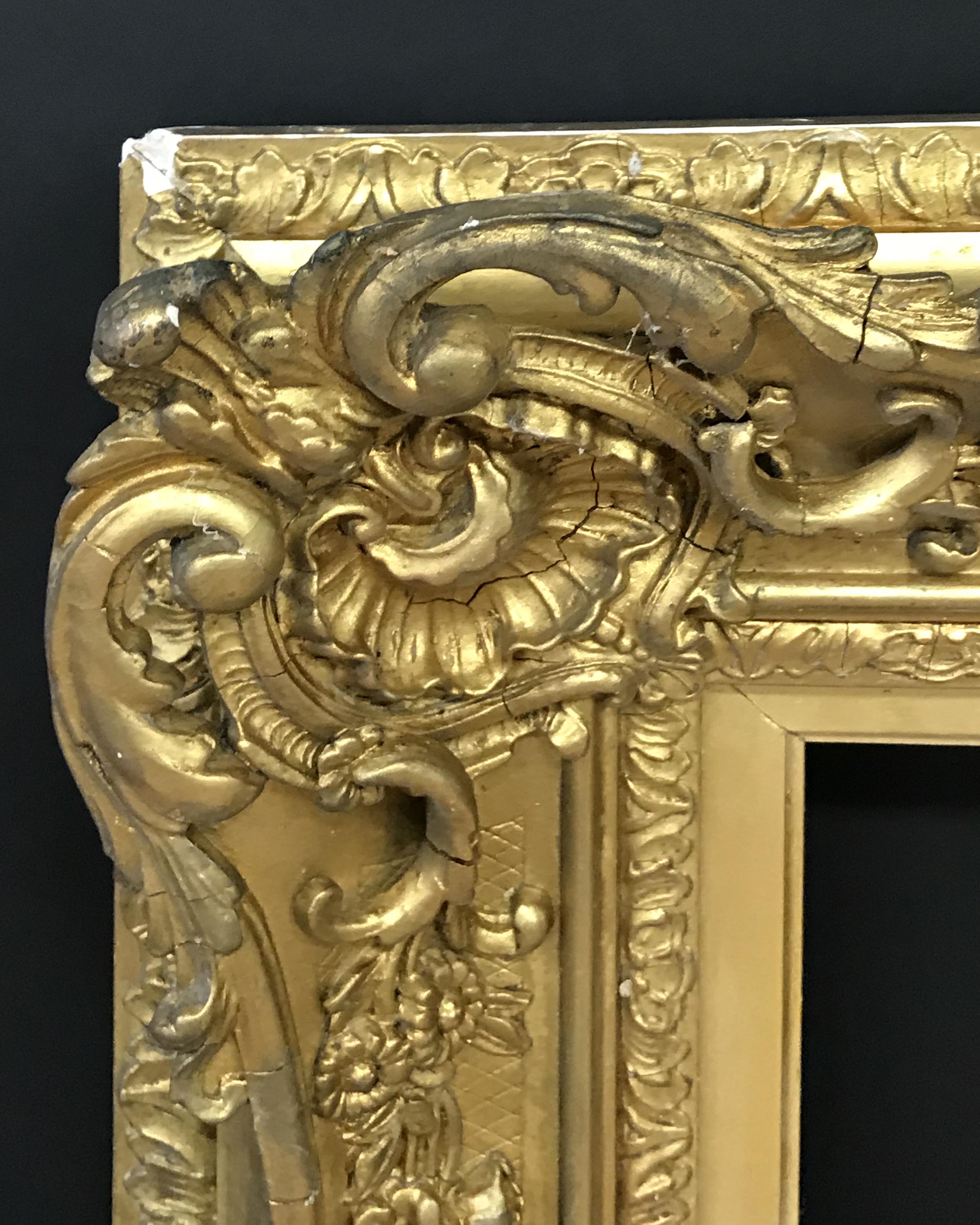 19th Century English School. A Gilt Composition Frame, with Swept and Pierced Centres and Corners,