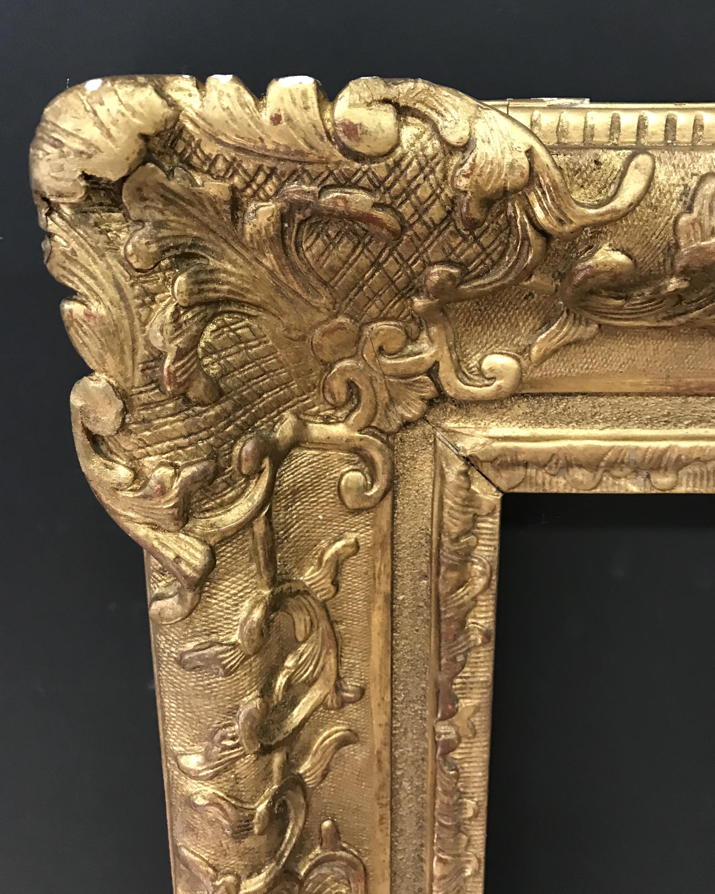 20th Century English School. A Louis Style Gilt Composition Frame, with Swept Centres and Corners,