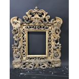 18th Century Italian School. A Carved Giltwood and Composition Altar Frame, with Swept and Pierced