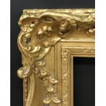 20th Century English School. A Gilt Composition Frame, with Swept and Pierced Centres and Corners,