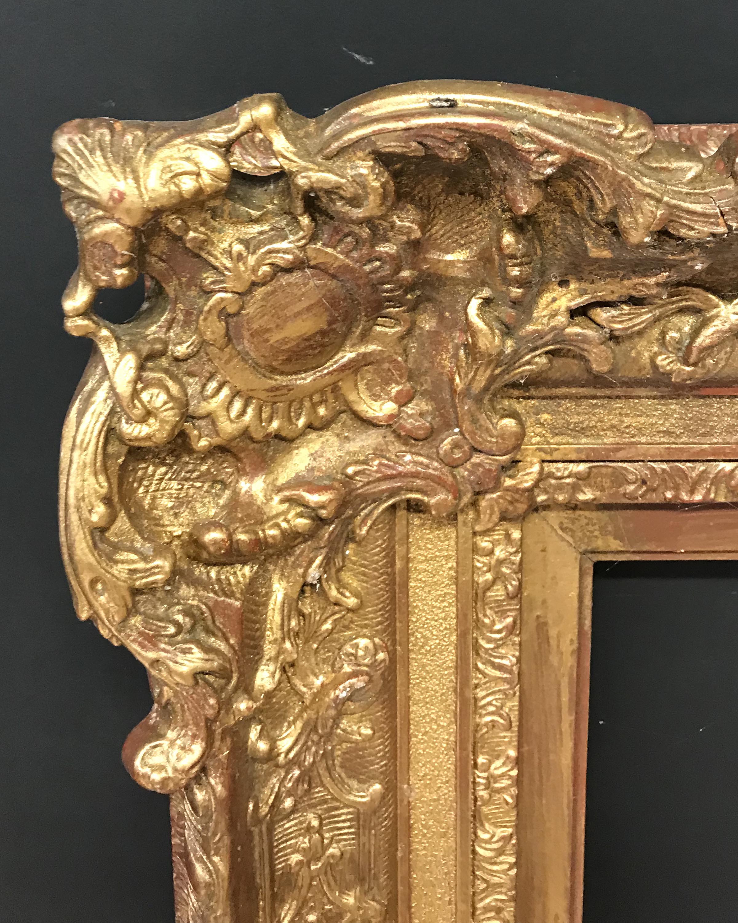 19th Century English School. A Gilt Composition Frame, with Swept Centres and Corners, 45.75" x 35.