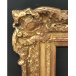 19th Century English School. A Gilt Composition Frame, with Swept Centres and Corners, 45.75" x 35.