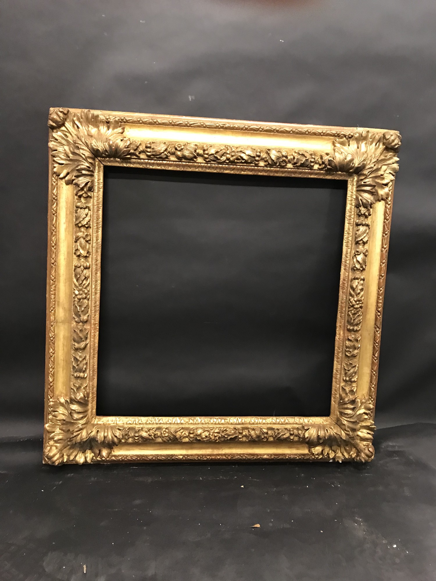 18th Century Italian School. A Carved Giltwood Frame, with Swept Corners, 24.5" x 24" (rebate). - Image 2 of 3