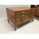 A Three Piece Plan Chest, with Six Drawers, (h) 34.75" x (w) 57.5" x (d) 34.5".