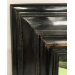 19th Century Dutch School. A Dark Wood Frame, with Inset Mirror, 16" x 12" (rebate).