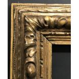 19th Century European School. A Carved Giltwood Frame, 68" x 42.5" (rebate).