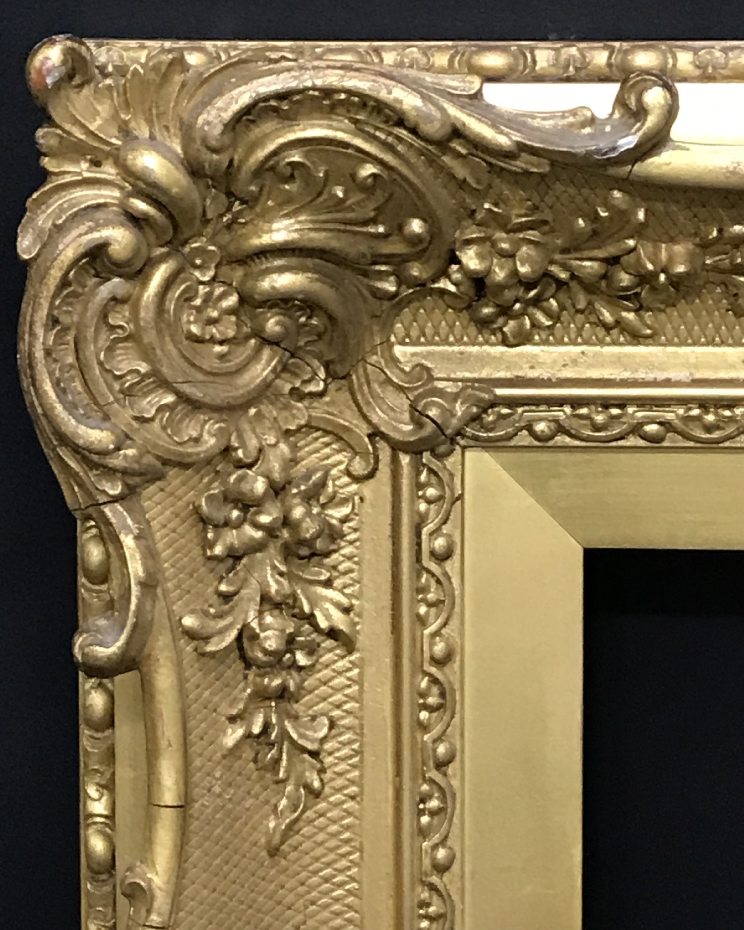 19th Century English School. A Gilt Composition Frame, with Swept Centres and Corners, 10.75" x 10.