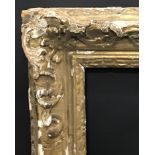 19th Century English School. A Carved Giltwood Frame, with Swept Corners, 25" x 19.5" (rebate).