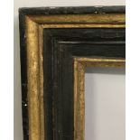 20th Century English School. A Dark Wood Frame, with inner and outer gilding, with purpose build bow