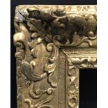 Late 18th Century French School. A Louis XV Carved Giltwood Frame, with Swept Centres and Corners,