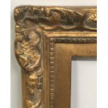 20th Century French School. A Gilt Composition Frame, with Swept Corners, 15" x 8" (rebate), and