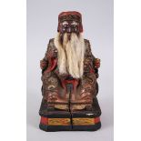A GOOD 19TH CENTURY CHINESE WOOD & LACQUER SEATED SAGE FIGURE, seated upon his throne, wearing