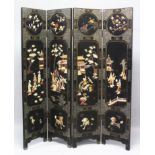 AN EARLY 20TH CENTURY CHINESE HARDSTONE & BONE ON LAID FOUR-FOLD LACQUERED WOOD SCREEN, each fold