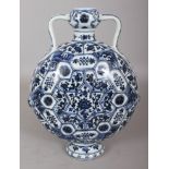 A CHINESE MING STYLE BLUE & WHITE PORCELAIN MOON FLASK, decorated with a variety of small