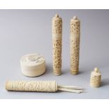 THREE 19TH CENTURY CHINESE CANTON NEEDLE / BODKIN CASES & CYLINDRICAL IVORY POT, each carved with