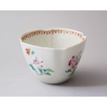 AN 18TH CENTURY CHINESE FAMILLE ROSE PORCELAIN TEA CUP, with inverted rim corners, and finely