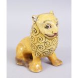 A 19TH CENTURY YELLOW GLAZED PERSIAN LION, with stylized painted mane design, 14cm high x 14,5cm