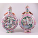 A PAIR OF 19TH CENTURY CHINESE FAMILLE ROSE LIDDED PORCELAIN PILGRIM BOTTLES / MOON FLASKS, both