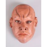 A GOOD JAPANESE MEIJI PERIOD WOOD & LACQUER NOH MASK, with a frowning expression, eyes formed from