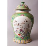 A LARGE CHINESE FAMILLE ROSE PORCELAIN JAR & COVER, finely decorated with panels of birds &
