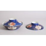 A GOOD 19TH CENTURY CHINESE BLUE GROUND BOWL & COVER, together with a spare cover, the bowl & covers